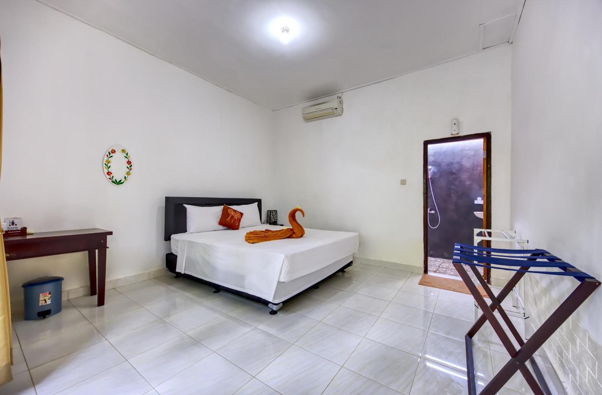 Ari La Casa Hotel Toyapakeh Quarto foto